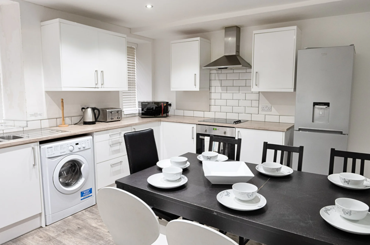 Woodlands House modern kitchen with dining table